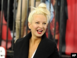 FILE - Singer Sia Furler attends the world premiere of "Annie" at the Ziegfeld Theatre in New York.