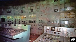 The control room and its damaged machinery is seen inside reactor No. 4 in the Chernobyl nuclear power plant in Ukraine, November 2000 (file photo)