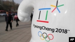 The official emblem of the 2018 Pyeongchang Olympic Winter Games is seen in downtown Seoul, South Korea, Jan. 18, 2018.