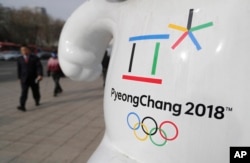 The official emblem of the 2018 Pyeongchang Olympic Winter Games is seen in downtown Seoul, South Korea, Jan. 18, 2018.