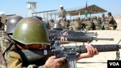 Inside a sprawling desert-like compound on the outskirts of Kabul, some 11,000 soldiers, non-commissioned officers and officers are training to join the Afghan army, November 2012. (Sharon Behn/VOA)