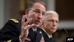 U.S. Army General Robert Abrams (L) testifies during his nomination hearing to be commander of all U.S. forces in Korea, on Capitol Hill in Washington, Sept. 25, 2018.