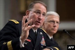 U.S. Army General Robert Abrams (L) testifies during his nomination hearing to be commander of all U.S. forces in Korea, on Capitol Hill in Washington, Sept. 25, 2018.