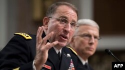 U.S. Army General Robert Abrams (L) testifies during his nomination hearing to be commander of all U.S. forces in Korea, on Capitol Hill in Washington, Sept. 25, 2018.