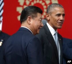 资料照：美国总统奥巴马与中国领导人习近平在秘鲁出席亚太经合组织峰会期间会面。（2016年11月20日）