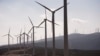 Wind farms like this array of turbines near Tangiers, Morocco, present a renewable energy alternative to traditional sources of electricity in Africa. 