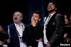 Russia's Sergey Lazarev (C) reacts during the final vote counting during the Eurovision Song Contest final at the Ericsson Globe Arena in Stockholm, Sweden, May 14, 2016.