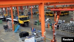 FILE - A factory floor of XCMG Group is seen in Xuzhou, Jiangsu province, China, Aug. 14, 2015. 