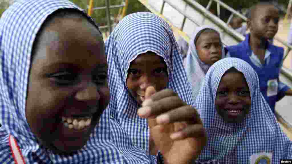 Schoolgirls play outside El-Kanemi Islamic School in Maiduguri.