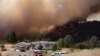 ماموران آتش نشانی در تلاش برای مهار آتش سوزی در پلیموث، کالیفرنیا - ۴ امرداد ۱۳۹۳