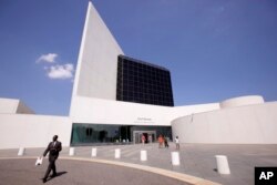 FILE - This Aug. 19, 2009, file photo shows the entrance of the John F. Kennedy Presidential Library and Museum, designed by architect I.M. Pei, in Boston. (AP Photo/Steven Senne, File)