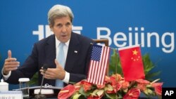 Menlu AS John Kerry di Beijing (7/6).