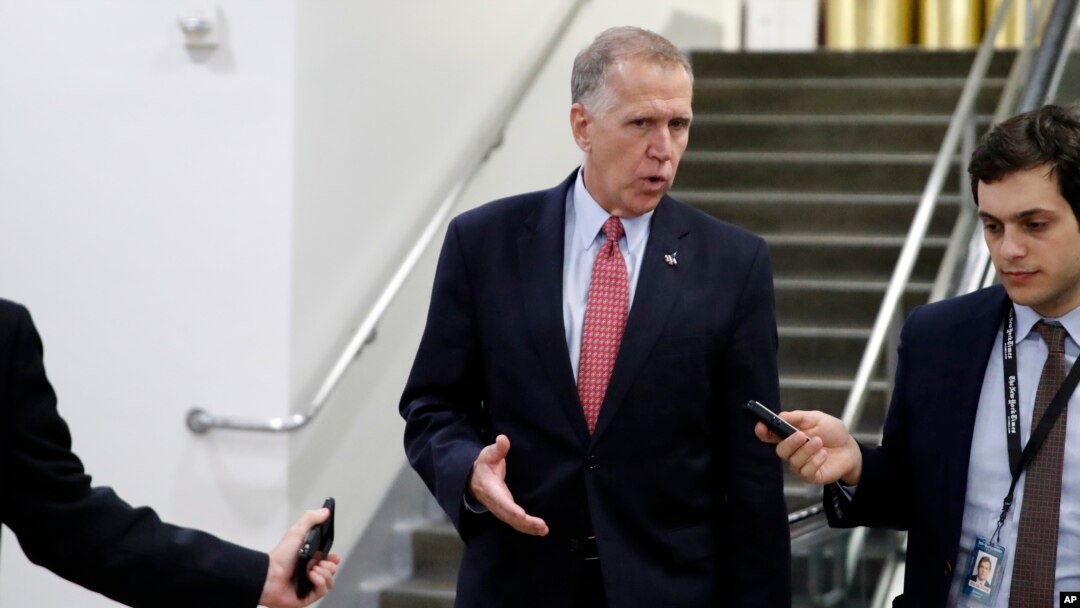 Sen. Thom Tillis, R-N.C., talks with reporters as he departs after a vote to confiirm Gina Haspel as CIA director, on Capitol Hill, May 17, 2018 in Washington.