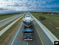 Robert Swan trucked a sailboat overland in Africa to raise awareness about the environment and HIV/AIDS