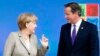 Прем'єр-міністр Великої Британії Дейвид Кемерон і канцлер Німеччини Ангела Меркель перед початком саміту НАТО в Уельсі, 4 вересня 2014 р.