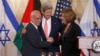 Secretary of State John Kerry stands between Israel's Justice Minister and chief negotiator Tzipi Livni, right, and Palestinian chief negotiator Saeb Erekat, as they shake hands after the resumption of Israeli-Palestinian peace talks, July 30, 2013, at the State Department.