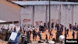 Inmates are seen during an uprising at Alcacuz prison in Natal, Rio Grande do Norte state, Brazil, Jan. 19, 2017. 