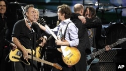 From left, Rusty Anderson, Bruce Springsteen, Joe Walsh, Paul McCartney, and Dave Grohl perform during the 54th annual Grammy Awards in Los Angeles, February 12, 2012. (AP Photo/Matt Sayles)