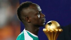 USadio Mane odlalela iqembu leSenegal emidlalweni eyeAfrica Cup of Nations. (AP)