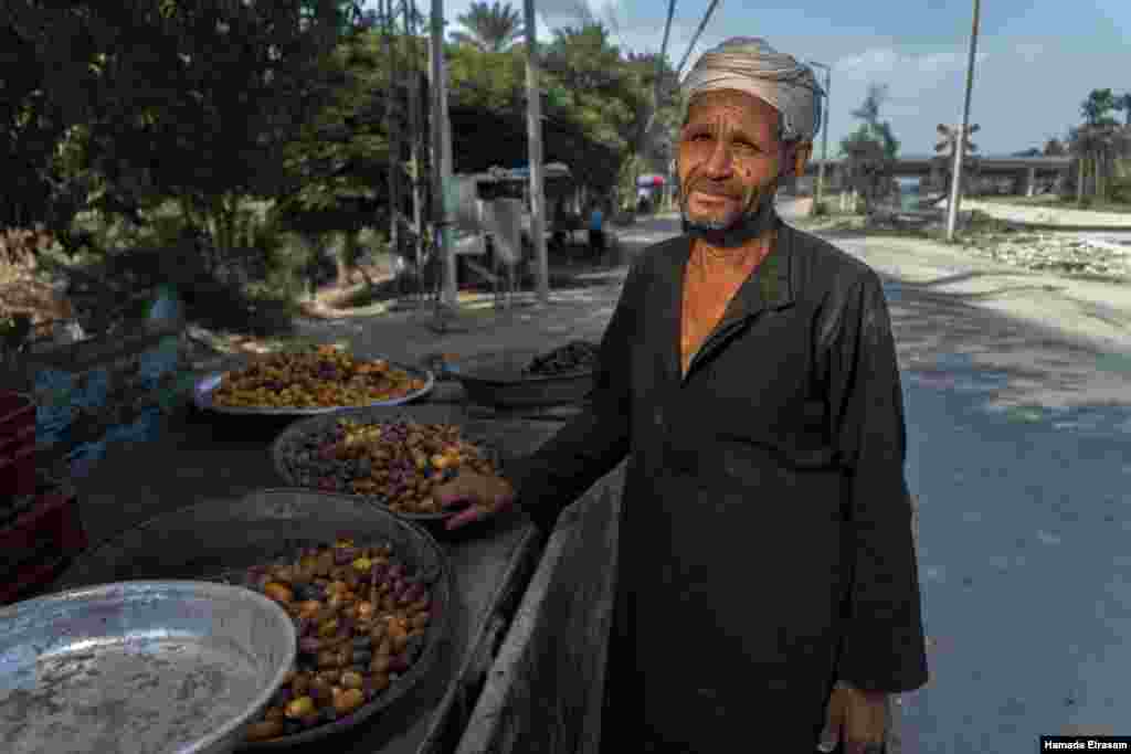 &quot;This year, the dates are not as sweet as they used to be, and they go bad quickly,&quot; says Farhan, 58, a father of seven who has been cultivating and trading the fruit for more than 45 years, in Cairo, September 9, 2021. (VOA/Hamada Elrasam)