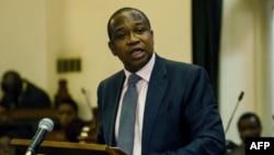 Minister of Finance Mthuli Ncube presents his budget statement in the Parliament of Zimbabwe, Nov. 22, 2018, in Harare.