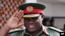 FILE - Nigerian army chief Lt. Gen. KTJ Minimah, during a function in Lagos, Feb. 19, 2015.