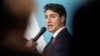 Canadian Prime Minister Justin Trudeau speaks at the Paris Peace Forum as part of the commemoration ceremony for Armistice Day, in Paris, Nov. 11, 2018. 