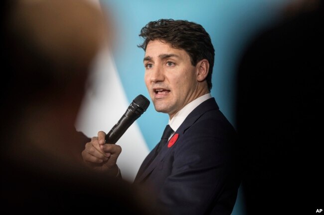 Canadian Prime Minister Justin Trudeau speaks at the Paris Peace Forum as part of the commemoration ceremony for Armistice Day, in Paris, Nov. 11, 2018.