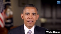 President Barack Obama is seen delivering his weekly address (White House video screen grab).