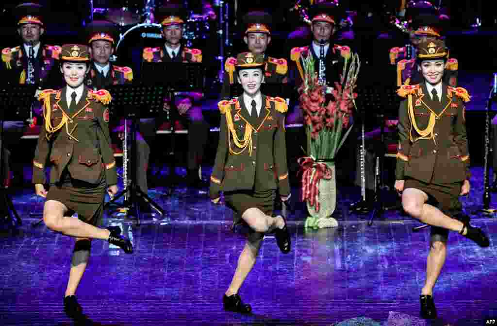 The Ensemble of Korean People&#39;s Army of North Korea performs on the Russia&#39;s Army Theatre&#39;s stage during the &quot;Spasskaya Tower&quot; international military music festival in Moscow, Russia.