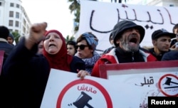 Protesters shout slogans against rising prices and tax increases in Tunis, Tunisia, Jan. 13, 2018.