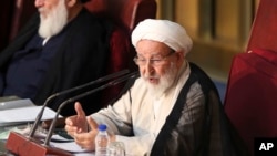FILE - Chairman of the Iran's Assembly of Experts Ayatollah Mohammad Yazdi speaks during their biannual meeting in Tehran, Iran, Sept. 1, 2015. Yazdi, a leading conservative on the panel, was not re-elected last week.