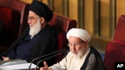 FILE - Chairman of the Iran's Assembly of Experts Ayatollah Mohammad Yazdi speaks during their biannual meeting in Tehran, Iran, Sept. 1, 2015. Yazdi, a leading conservative on the panel, was not re-elected last week.