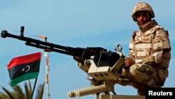 A member of the Libyan army is seen at the Mellitah Oil and Gas complex, west of Tripoli, March 4, 2013. 
