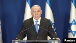 Israeli Prime Minister Benjamin Netanyahu delivers a statement in Jerusalem, Feb. 13, 2018.