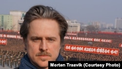 Norwegian Director Morten Traavik in Pyongyang during a mass rally in Kim Il Sung Square on March 7, 2013.