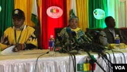 Zimbabwe Electoral Commission head Priscilla Chigumba speaks to reporters and observers in Harare flanked by deputy Joyce Kazembe and her chief officer Utoile Silaigwana, July 30, 2018. 