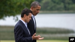 President Barack Obama with Mexico President Enrique Pena Nieto at the G-8 summit in Northern Ireland, June 18, 2013. 