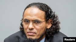 FILE - Ahmad al-Faqi al-Mahdi appears at the International Criminal Court in The Hague, Netherlands, Aug. 22, 2016 at the start of his trial. 