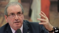 FILE - Brazil's former President of the Chamber of Deputies Eduardo Cunha speaks during the presentation of his defense in the Chamber of Deputies, in Brasilia, July 12, 2016. 