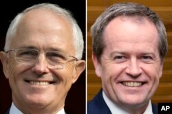 FILE - This combination of file photos from April 15, 2016, and July 8, 2014, shows Australian Prime Minister Malcolm Turnbull, left, and Australian opposition leader Bill Shorten.