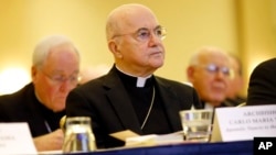 FILE - Archbishop Carlo Maria Vigano, Apostolic Nuncio to United States, listens to remarks at the United States Conference of Catholic Bishops' annual fall meeting, Nov. 16, 2015, in Baltimore.