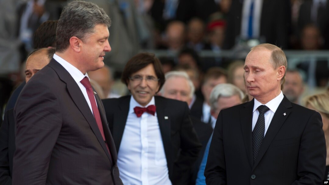 Novoizabrani predsednik Ukrajine Petar Porošenko i predsednik Rusije Vladimir Putin