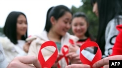 中國重慶的義工呼籲關注愛滋病