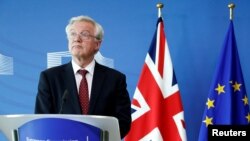 FILE - Britain's Secretary of State for Exiting the European Union David Davis looks on during a joint news conference with European Union's chief Brexit negotiator Michel Barnier (not pictured) ahead of Brexit talks in Brussels, Belgium Aug. 28, 2017. 
