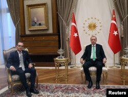Turkish President Tayyip Erdogan meets with German Foreign Minister Heiko Maas in Ankara, Turkey, Sept. 5, 2018.