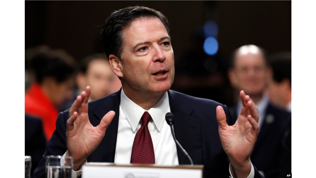 FILE - Former FBI Director James Comey testifies during a Senate Intelligence Committee hearing on Capitol Hill, June 8, 2017, in Washington.
