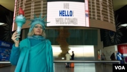 Lindley Hanlon, a film professor at CUNY, spent Monday afternoon at JFK International Airport to welcome refugees. "I'm trying to welcome people to our shores, as I've always done for 131 years,” she said, referring to Lady Liberty’s arrival in New York harbor in June of 1885. (Ramon Taylor/VOA)