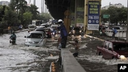 Tropical Storm Aere pounds the Philippines. Developing nations want industrialized countries to increase funding to help them cope with the effects of climate change, including rising sea levels and more violent storms. 