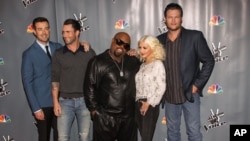 From left, Carson Daly, Adam Levine, CeeLo Green, Christina Aguilera and Blake Shelton attend "The Voice" Season 5 Top 12 red carpet event at Universal Studios, Nov. 7, 2013 in Universal City, Calif.
